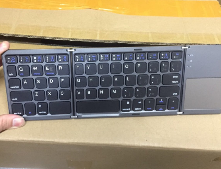 Ultra-Thin Tri-Fold Bluetooth Touch Keyboard – Portable & Wireless