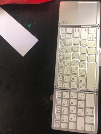 Ultra-Thin Tri-Fold Bluetooth Touch Keyboard – Portable & Wireless